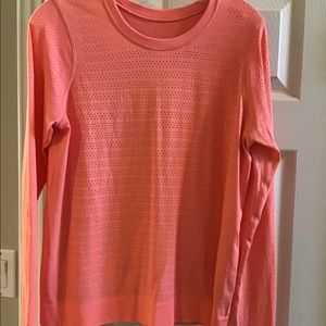 Lululemon top with tiny holes.